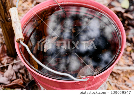 Water in a fire bucket Water in a fire bucket 139059847