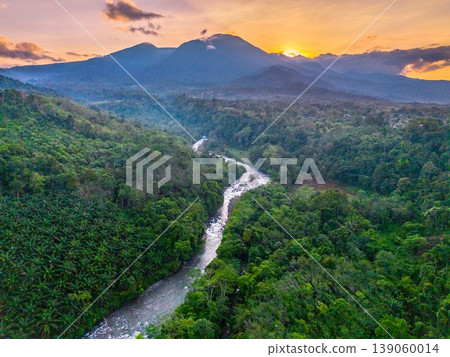 Beautiful morning view in Indonesia, panoramic landscape of rice fields with mountain ranges and clear sky Beautiful morning view in Indonesia, panoramic landscape of rice fields with mountain ranges and clear sky 139060014