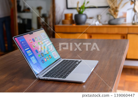 A laptop computer viewed from an angle, and the interior. 139060447