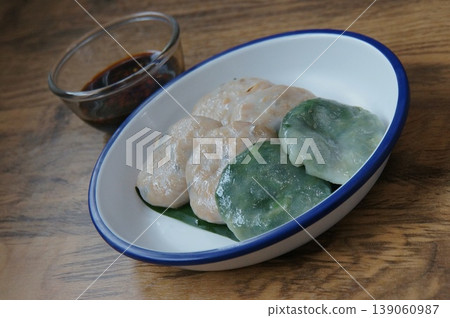 Steamed Chives Dumplings with Bamboo Shoots and Sweet Soy Dipping Sauce 139060987