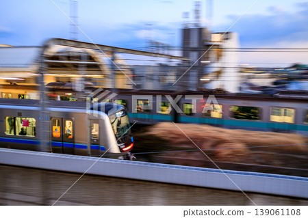 The view of passing trains from Kyodo Station The view of passing trains from Kyodo Station 139061108