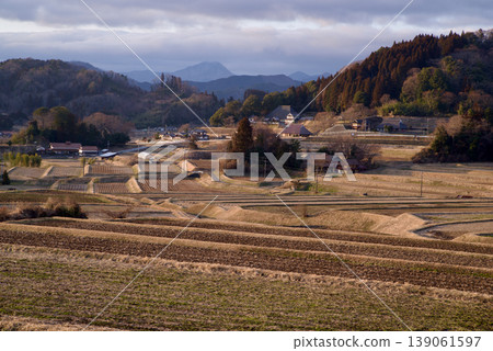 Connecting the Heritage of Terraced Rice Fields: Terraced Rice Fields of Hiwa Mikawachi - Early Spring, Evening Scenery, Iron Mine Remains Connecting the Heritage of Terraced Rice Fields: Terraced Rice Fields of Hiwa Mikawachi - Early Spring, Evening Scenery, Iron Mine Remains 139061597