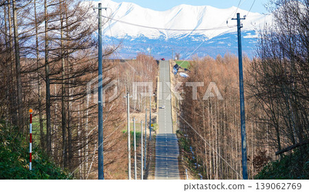 The new roller coaster road in Asahikawa, Hokkaido in early spring The new roller coaster road in Asahikawa, Hokkaido in early spring 139062769