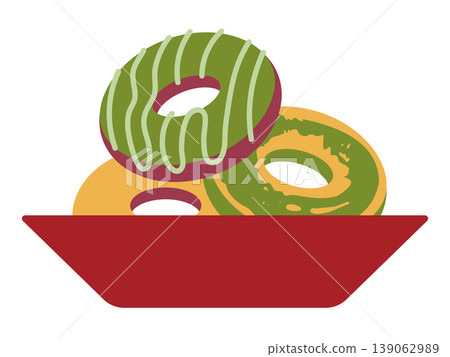A colorful and delicious-looking plate of matcha donuts. 139062989