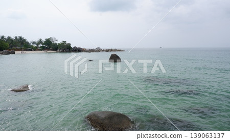 Wide Panorama of Siangau Beach with Granite Boulders and Blue Sea Wide Panorama of Siangau Beach with Granite Boulders and Blue Sea 139063137