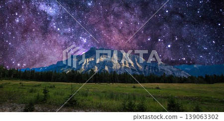 a beautiful night shot of a mountain in the night starry sky a beautiful night shot of a mountain in the night starry sky 139063302