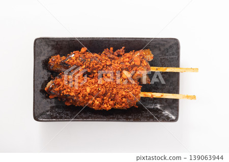 Spicy grilled chicken thigh (crispy, with chili oil) Spicy grilled chicken thigh (crispy, with chili oil) 139063944