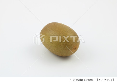 A photo of a kiwi that conveys the fruit's natural texture. A photo of a kiwi that conveys the fruit's natural texture. 139064041