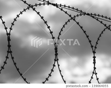 barbed wire used in a war zone barbed wire used in a war zone 139064055
