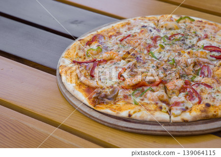 Fresh Italian pizza out of the oven Fresh Italian pizza out of the oven 139064115