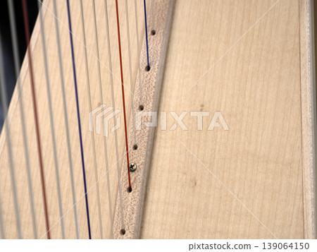 Harp instrument detail close up Harp instrument detail close up 139064150
