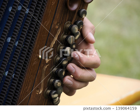 hands playing alpine bavarian accordion hands playing alpine bavarian accordion 139064159