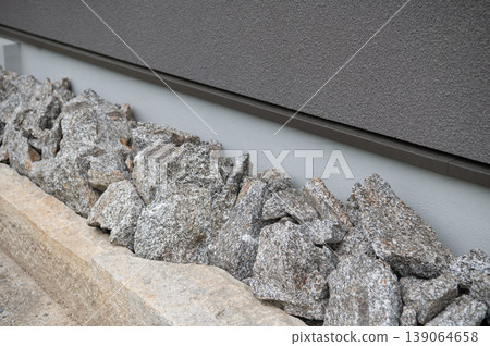 Exterior landscaping with crushed stone 139064658
