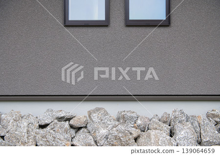 Exterior landscaping with crushed stone 139064659