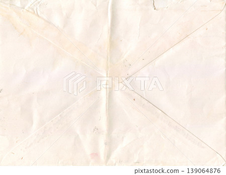 Worn envelope texture with crossed folds Worn envelope texture with crossed folds 139064876