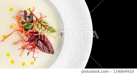 Cream soup with microgreens and olive oil fine dining minimal plating with copy space Cream soup with microgreens and olive oil fine dining minimal plating with copy space 139064910
