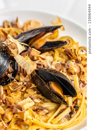 pasta mussels seafood noodles close up dish with shellfish and garnish pasta mussels seafood noodles close up dish with shellfish and garnish 139064944