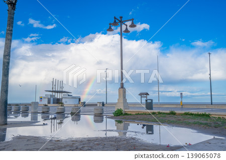 Rainbow over the Valencia Beach Promenade in Spain 139065078