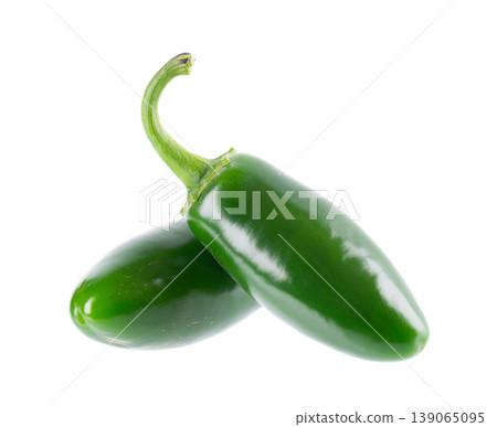 Fresh jalapeno pepper isolated on white background. Slices of green hot serrano pepper. Clipping path. Fresh jalapeno pepper isolated on white background. Slices of green hot serrano pepper. Clipping path. 139065095