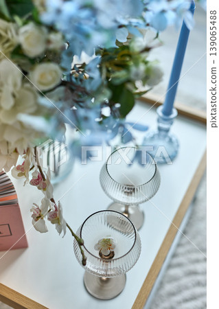 Modern Lifestyle Table Decor with Blue Flowers 139065488
