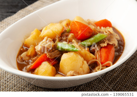 Curry meat and potato stew Curry meat and potato stew 139065531