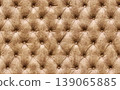 Captivating diamond tufting seamless texture in light brown color 139065885