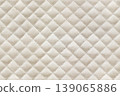 Seamless texture diamond-stitch design on beige upholstery suede fabric as background 139065886