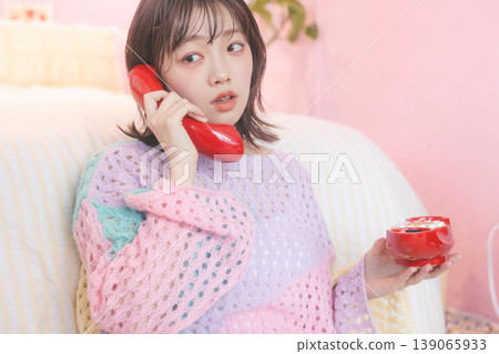 A woman making a phone call A woman making a phone call 139065933