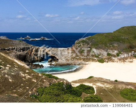 Ogi Pond on Minamijima Island in the Ogasawara Islands: White sandy beach and natural rock arch. Ogi Pond on Minamijima Island in the Ogasawara Islands: White sandy beach and natural rock arch. 139066481