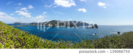A panoramic view of Chichijima Island and the Bonin Blue sea from Minamijima Island in the Ogasawara Islands. A panoramic view of Chichijima Island and the Bonin Blue sea from Minamijima Island in the Ogasawara Islands. 139066750