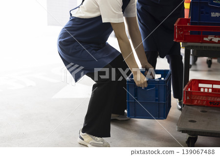 A woman with a crank A woman with a crank 139067488