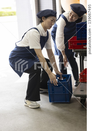 A woman with a crank A woman with a crank 139067495