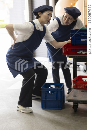 A woman with a crank A woman with a crank 139067632