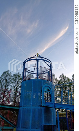 Large playground equipment and a clear evening sky Large playground equipment and a clear evening sky 139068122