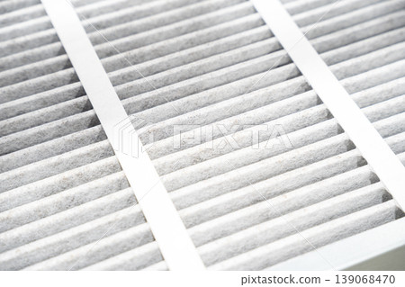 Close up of carbon air filter texture in air purifier. Close up of carbon air filter texture in air purifier. 139068470