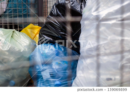 Plastic bottles and containers prepared for recycling Plastic bottles and containers prepared for recycling 139069899