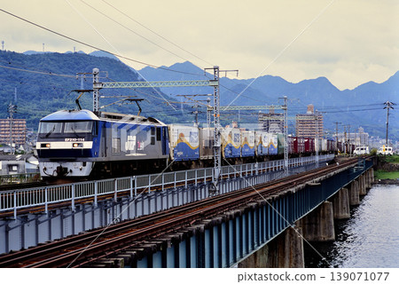 2007: EF210-114 container freight train running on the Sanyo Main Line 2007: EF210-114 container freight train running on the Sanyo Main Line 139071077
