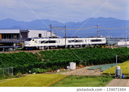 2007: A three-car 281 series train running on an embankment. 139071984