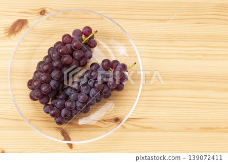 Delaware grapes placed on the table Delaware grapes placed on the table 139072411