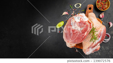 chicken meat raw legs and thigh on cutting board with spices garlic and herbs dark background copy space chicken meat raw legs and thigh on cutting board with spices garlic and herbs dark background copy space 139072576