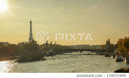 Eiffel Tower and Seine river at sunset, with Pont Alexandre III and tour boats in Paris, France Eiffel Tower and Seine river at sunset, with Pont Alexandre III and tour boats in Paris, France 139072940