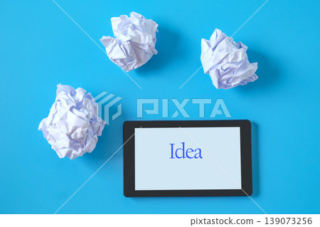 Tablet with Crumple the paper.creative concept. Tablet with Crumple the paper.creative concept. 139073256