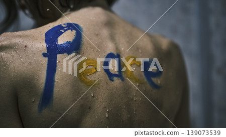 an activist woman and the message of peace in her body an activist woman and the message of peace in her body 139073539