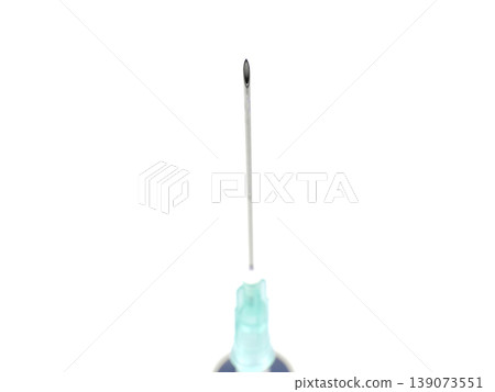 a syringe on a white background a syringe on a white background 139073551