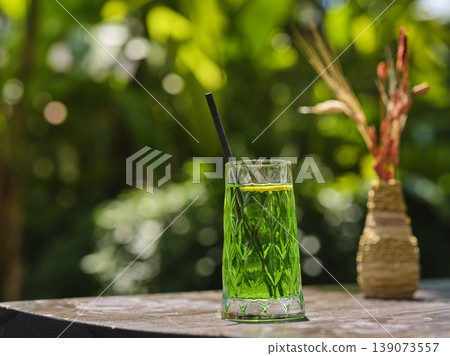 a delicious cocktail on a sunny day a delicious cocktail on a sunny day 139073557