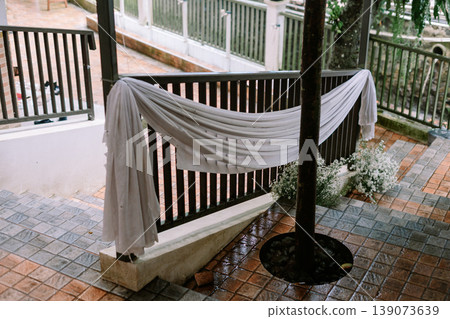 Outdoor Wedding Walkway Decoration with White Fabric and Floral Accents Outdoor Wedding Walkway Decoration with White Fabric and Floral Accents 139073639
