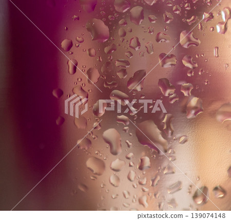 Pink background with water drops and light reflections. Space for text. Abstract wallpaper 139074148