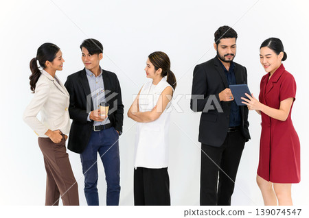 Group portrait of Young Asian Businesspeople talking while standing in a row. isolated on white background happy professional team people. Group portrait of Young Asian Businesspeople talking while standing in a row. isolated on white background happy professional team people. 139074547