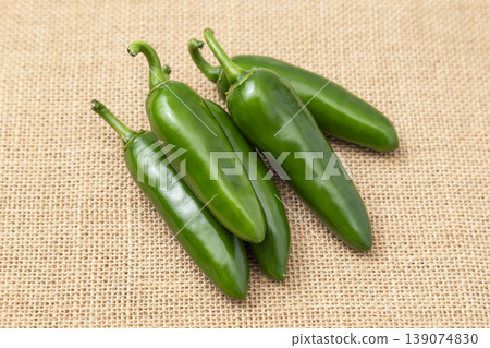 Jalapeños placed on a linen cloth 139074830