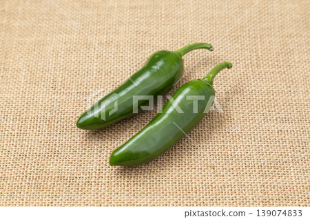 Jalapeños placed on a linen cloth 139074833